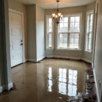 Professional water damage restoration in Dallas and North Dallas, TX showing a restored living space after flooding, highlighting expert cleanup, drying, and repair services to prevent mold and structural damage.
