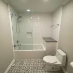 Modern bathroom with shower and toilet and Carrollton Bathroom Contractors